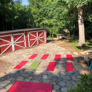 Outdoor Yoga Wednesdays at the Caboose! @ Mad Genius Studios